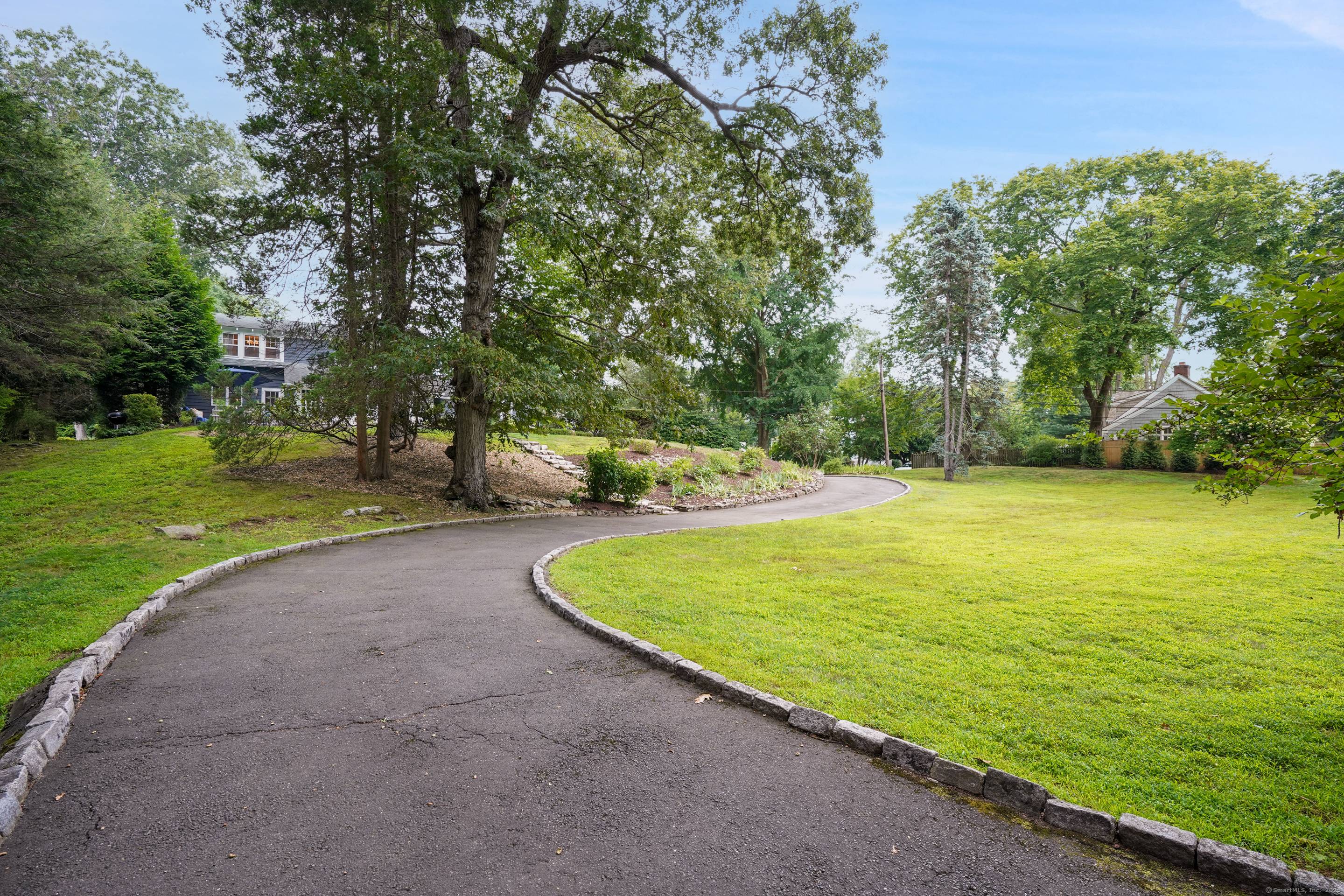 Chic style history blend effortlessly at this enchanted home and property.