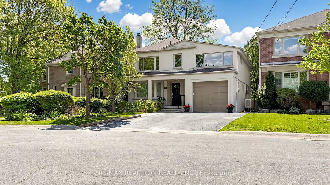 Rarely offered home on a private court in prestigious Armour Heights.