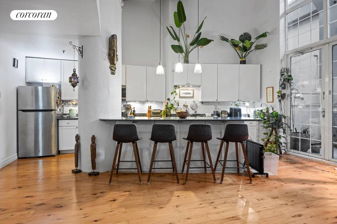 Step into a residence that truly lives like a house.