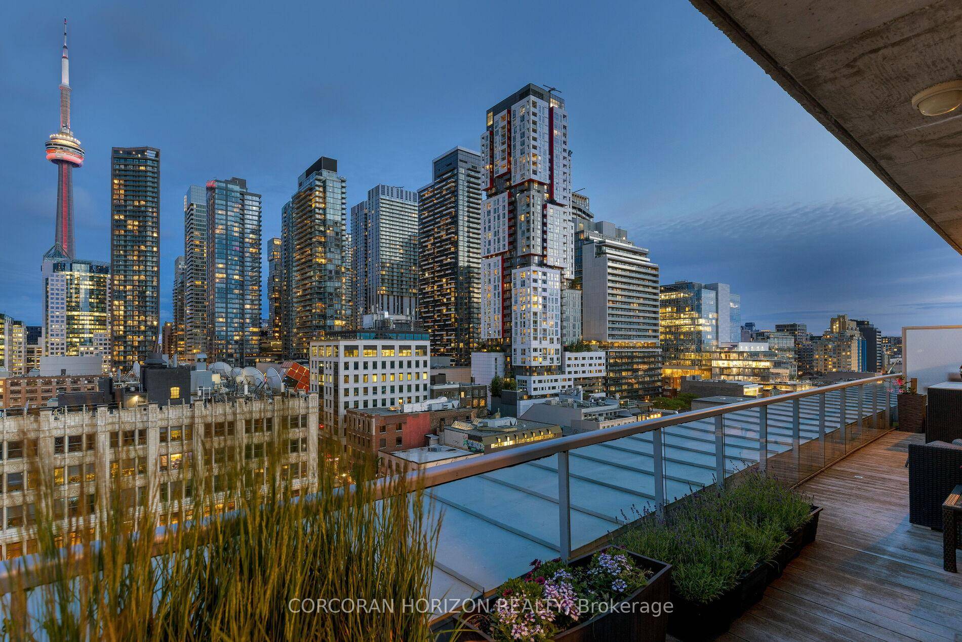 Perched above the city, this exquisite two storey boutique penthouse offers unobstructed views of the iconic CN Tower and the energy of Queen Street below.