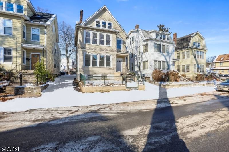 Welcome to 21 N 23rd St in East Orange, a spacious 2 family home offering strong income potential with a bonus third level unit for added flexibility.