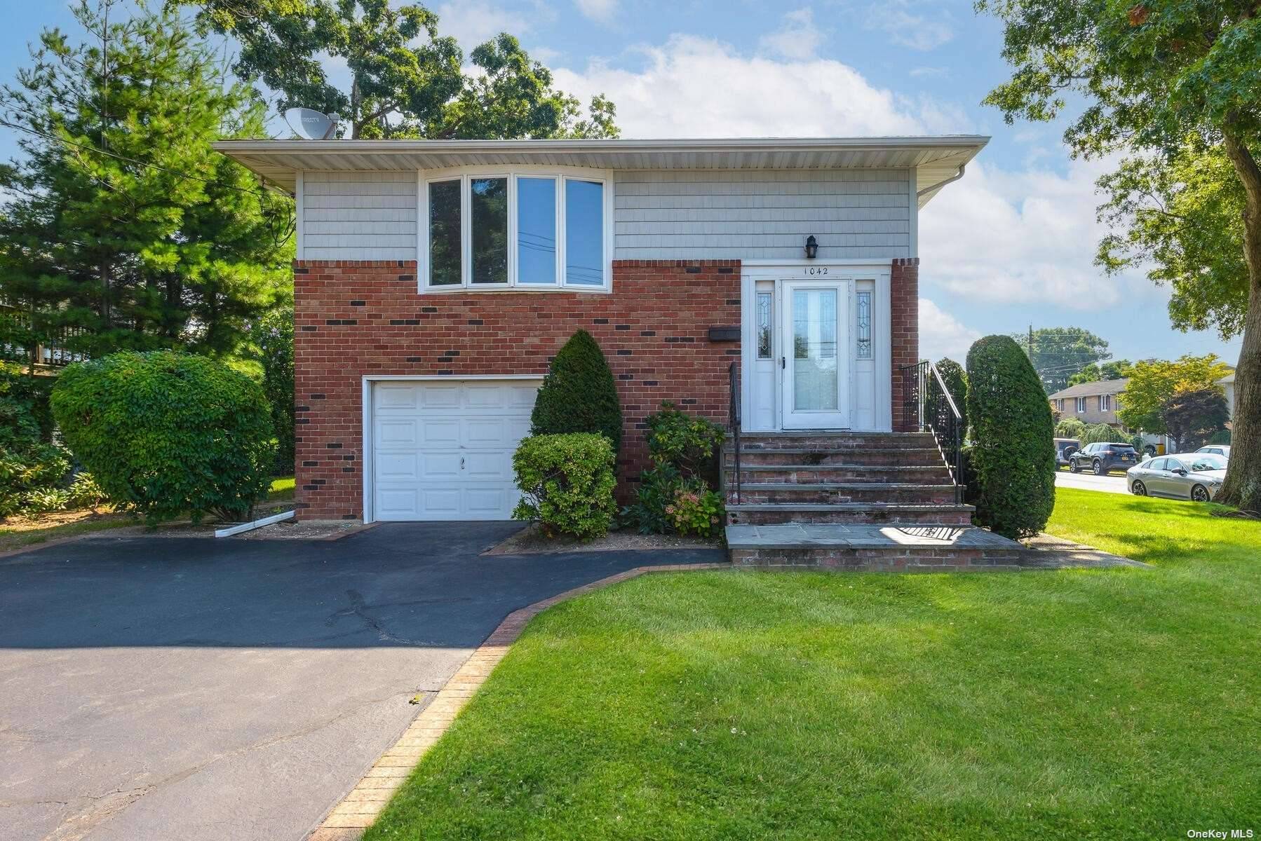 Welcome to this beautifully maintained hi ranch offering ample space over 2100 square feet !