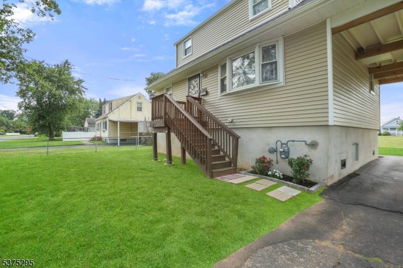 This beautiful, elevated cape was completely renovated in 2022 and features 3 bedrooms, 2 full bathrooms, recessed lighting, and an open concept kitchen with granite countertops, white shaker cabinets, stainless ...