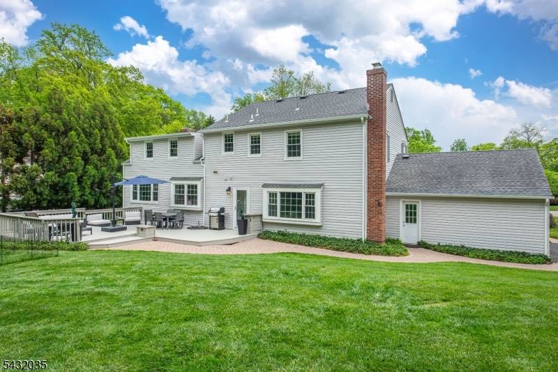 Welcome to this impeccably maintained and beautifully updated 5 bedroom, 3 full bath colonial located in one of the most desirable neighborhoods in Morris Township.