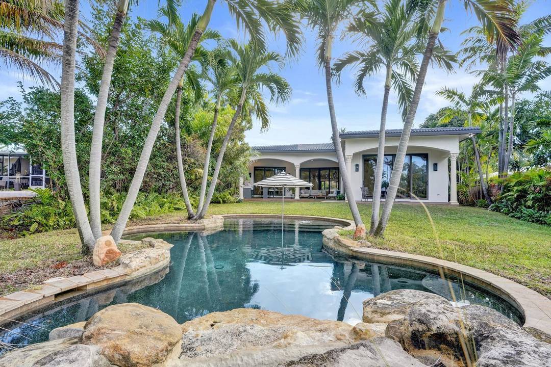 Situated on a private 19k sq ft waterfront lot, this private oasis offers 45 feet of dockage, huge front and back yard and unobstructed tranquil views of the Middle River.