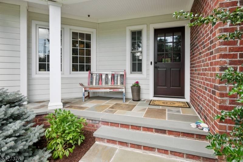 Nestled on a quiet Cul de sac, this beautiful colonial home is the perfect blend of space modern convenience.