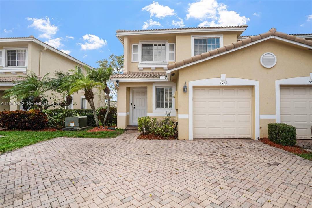 Immaculate 3 bedroom, 2 1 2 bathroom, 1 car garage corner unit townhouse in a gated community.