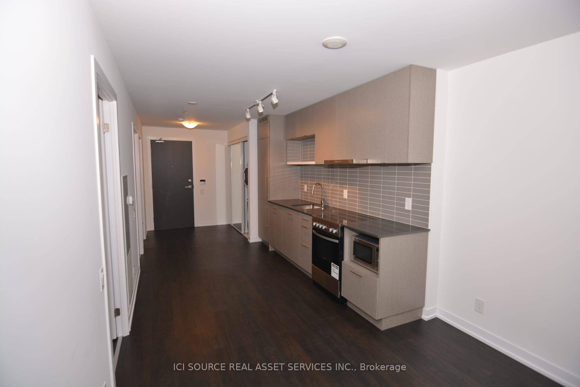 Functional and modern 1 Bedroom Den with Balcony.