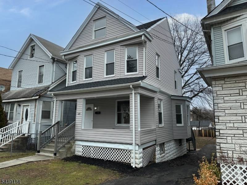 This Colonial home features traditional architecture and classic styling.