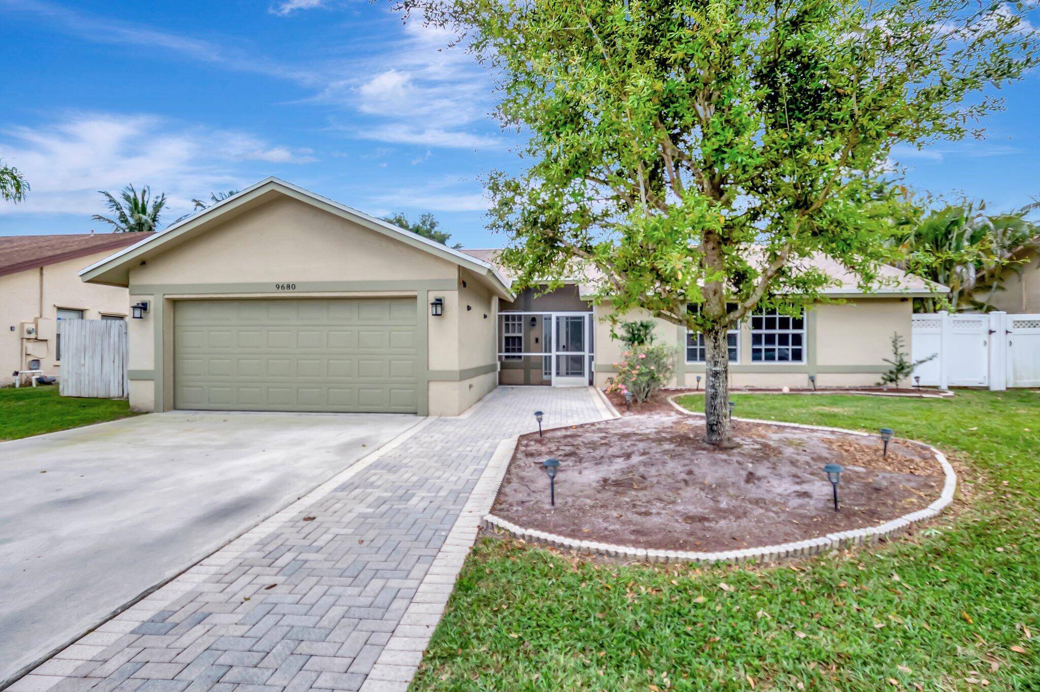 This beautifully maintained 3 bed, 2 bath home with a den bonus room offers the perfect blend of comfort, style, and South Florida living complete with a serene lake view ...