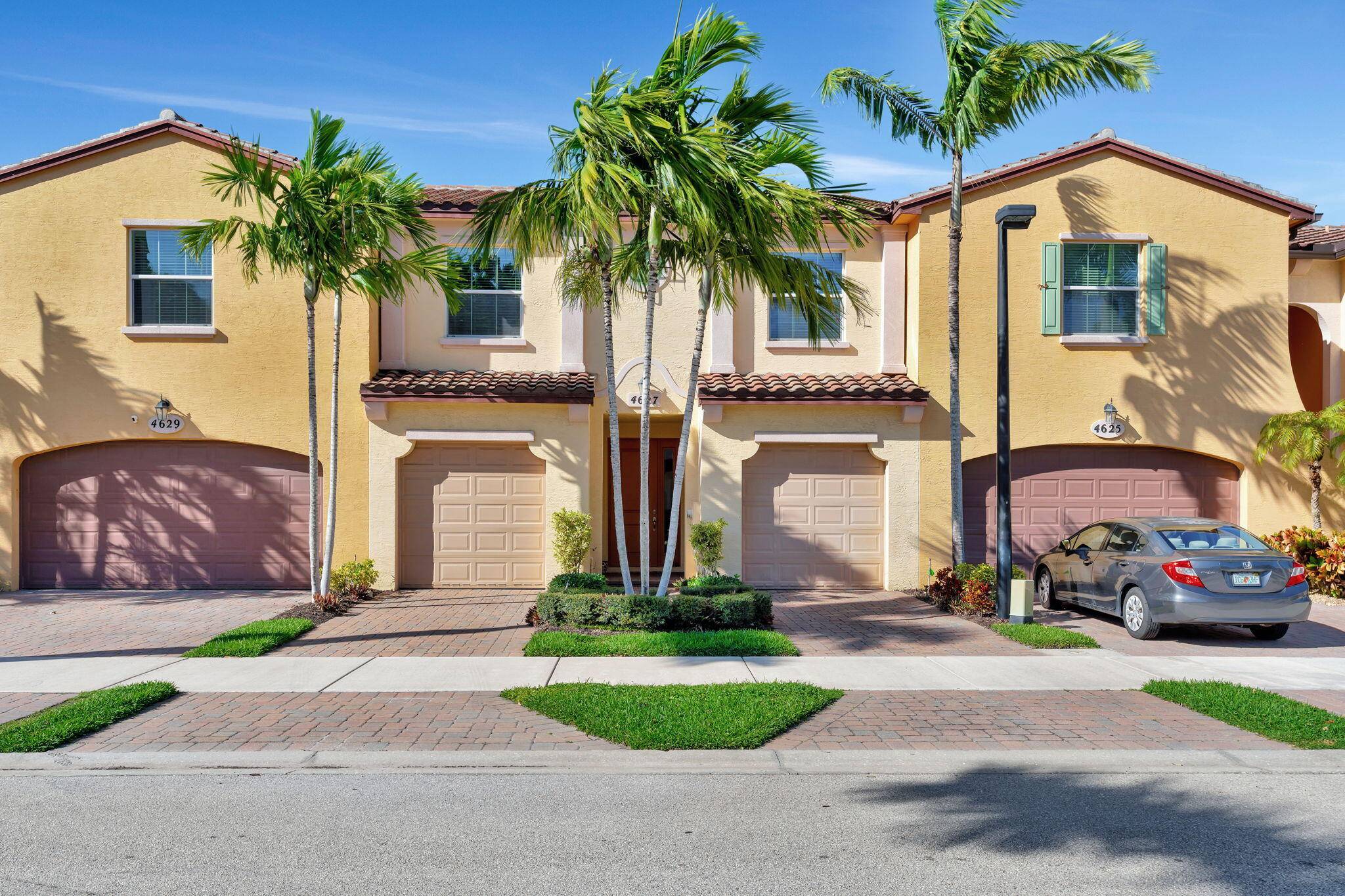 Motivated sellers. Enjoy luxury living in this spacious, secure townhouse with a beautiful view of the pool.