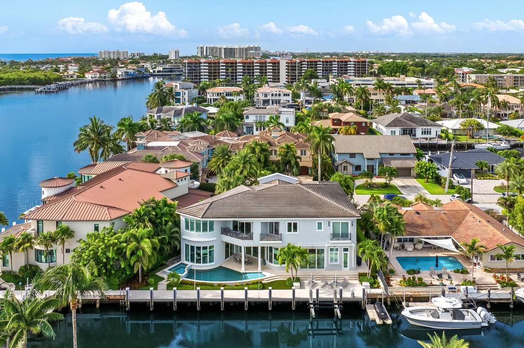 A rare offering from the esteemed Mary Widmer Luxury Collection, this modern West Indies estate epitomizes the height of waterfront living in Boca Raton.