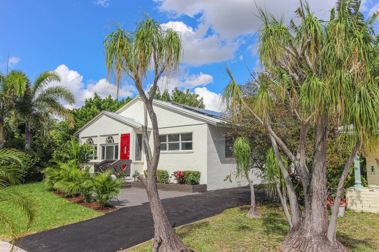 This is a rare find. A must see, stunning, completely renovated open three bedroom two bath home in the desirable Lake Park.