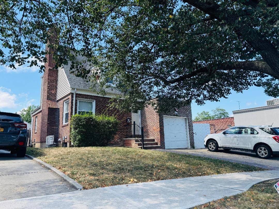 Exquisite brick single family home in the prestigious Jamaica Estates !