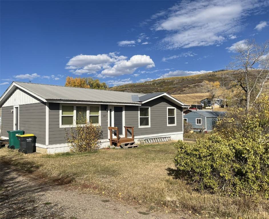 Situated on a large corner lot, this 3 bed, 2 bath home has great southern exposure allowing plenty of natural light to shine thru.
