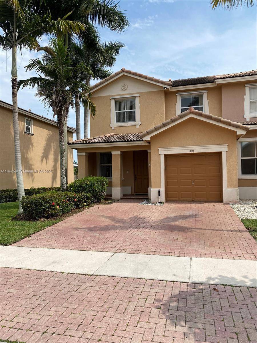 AMAZING corner unit with lake views in the exclusive community of Waterstone You can enjoy the a swimming pool, club house, lake, and charter school 24 hour security LOW HOA.