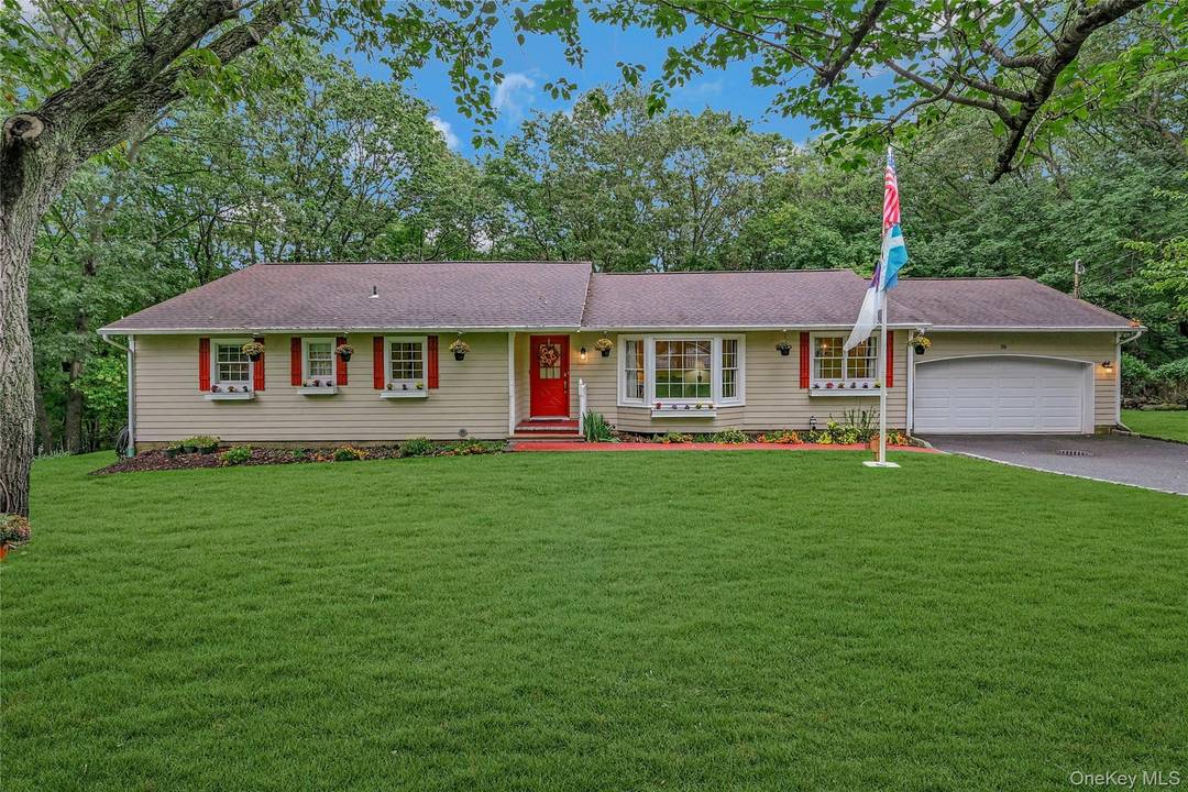 Quiet cul de sac location overlooking wooded hillside offering privacy and peacefulness is this meticulously maintained, expanded ranch in charming Port Jefferson neighborhood.