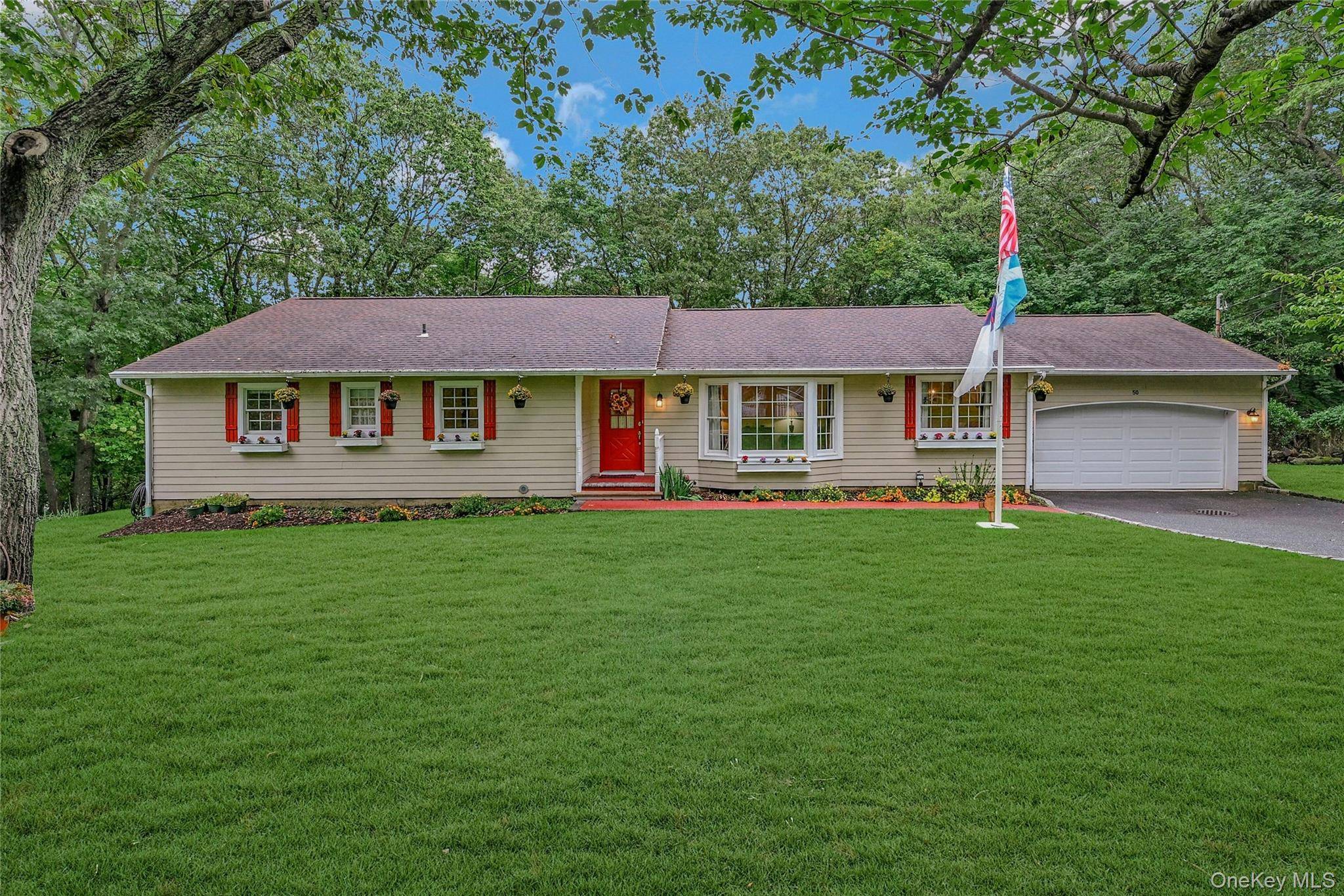 Quiet cul de sac location overlooking wooded hillside offering privacy and peacefulness is this meticulously maintained, expanded ranch in charming Port Jefferson neighborhood.