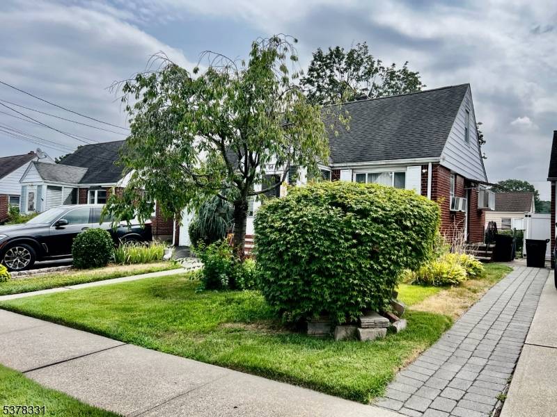 Welcome to this charming and spacious home located in a quiet and desirable neighborhood of Elmwood Park.