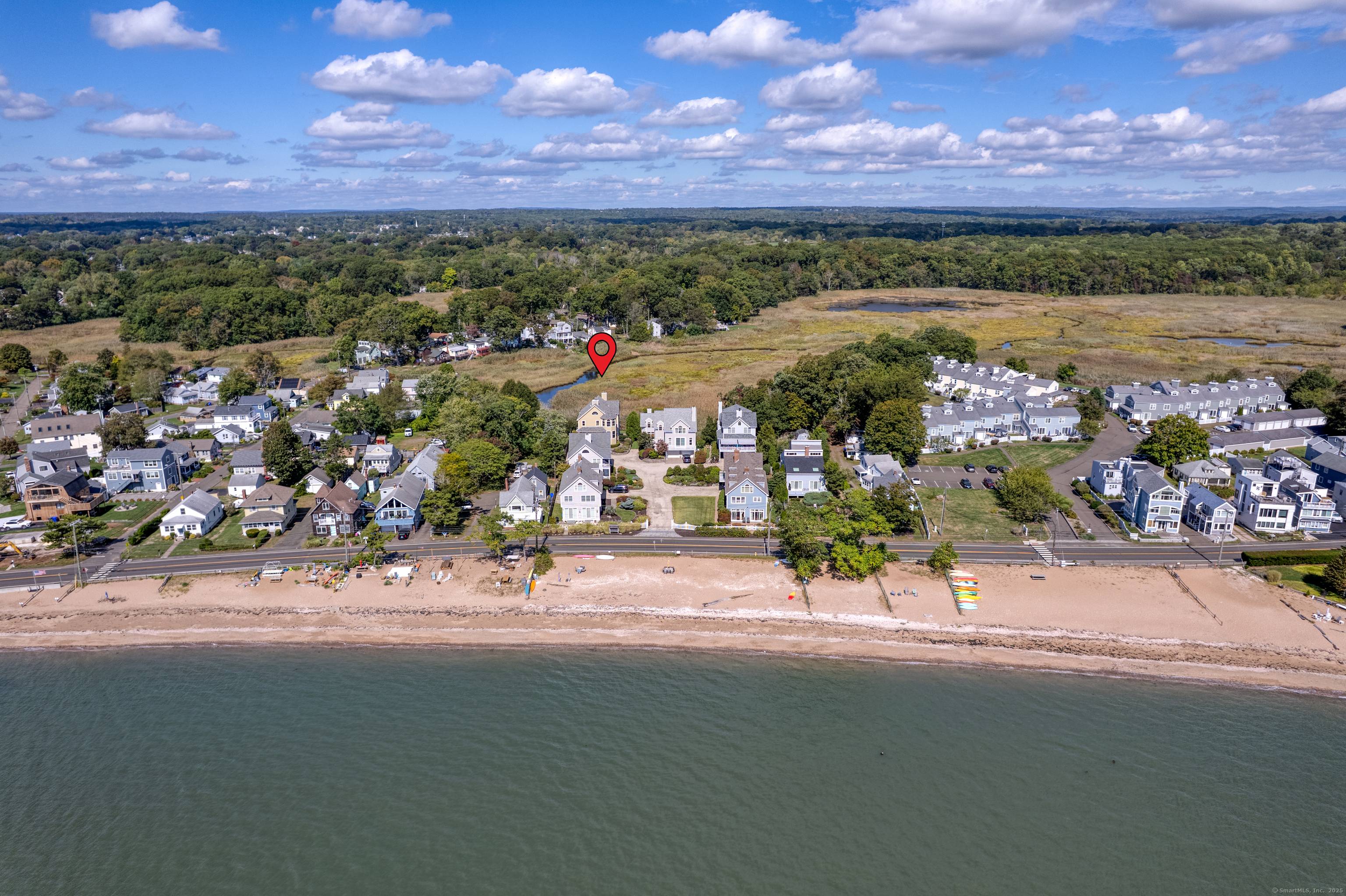 Stunning 3 bedroom, 4. 1 bathroom colonial set in an enclave of 6 homes, with a private beach and spectacular views of the marsh and Long Island Sound.