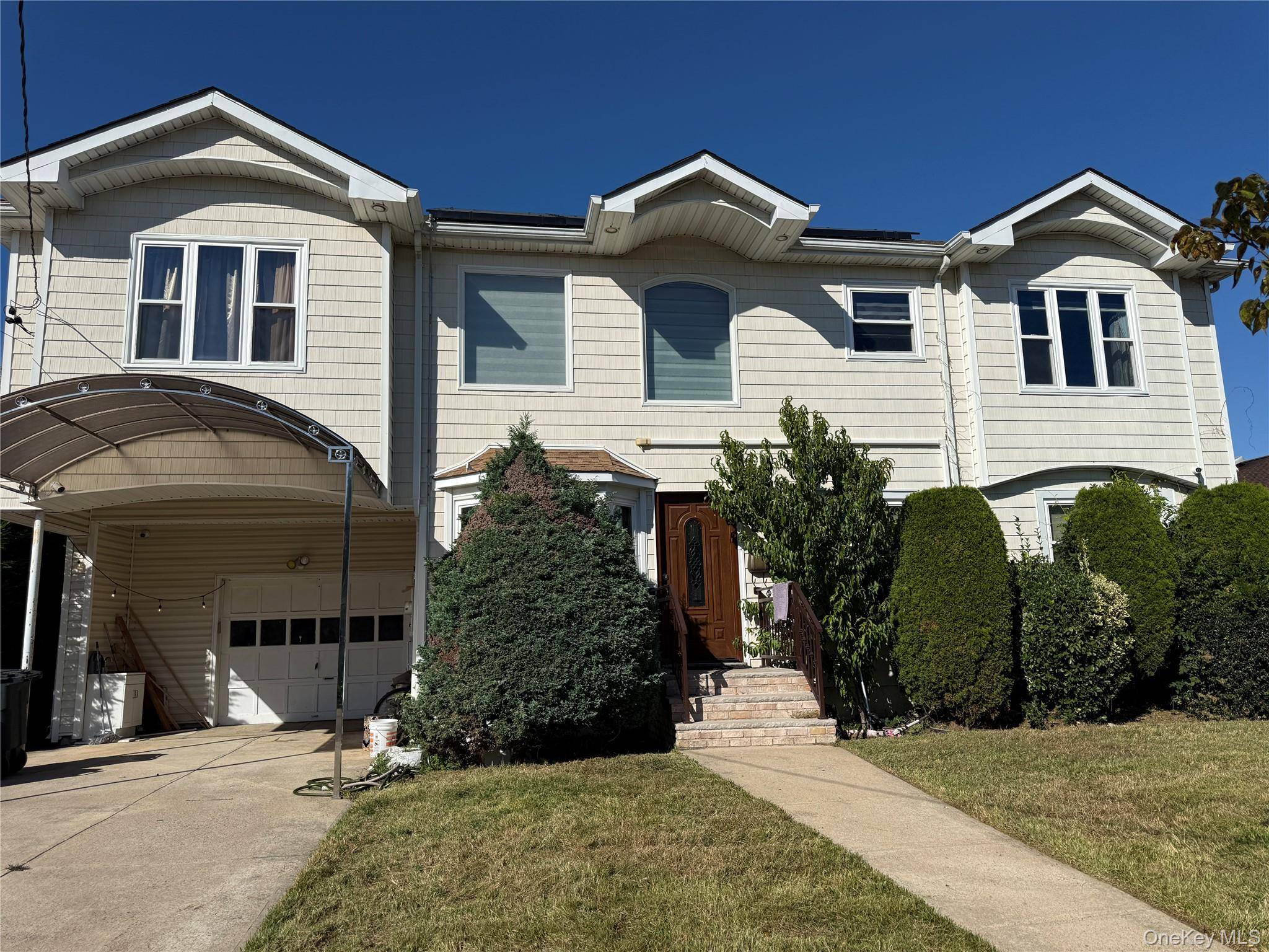 Welcome to this beautifully upgraded Colonial in Baldwin Harbor, offering spacious living, smart updates, and energy efficient features.