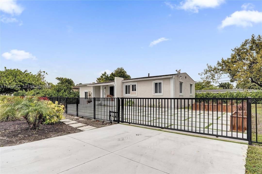 Welcome to this beautifully renovated 2 bedroom, 2 bathroom home featuring a separate 1 bedroom, 1 bathroom studio apartment that can be easily connected to the main residence.