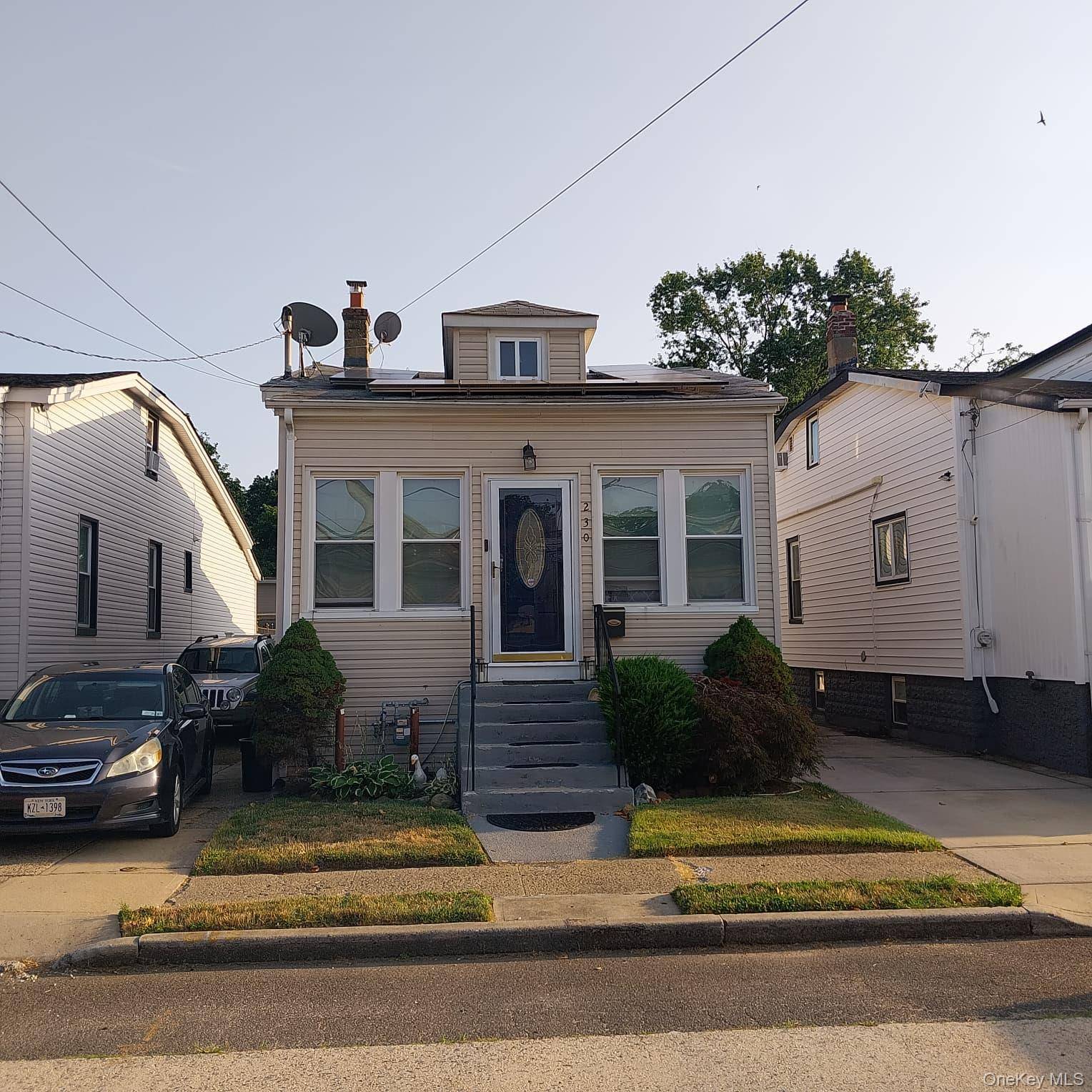 Welcome to this charming spacious 2 bedroom home, the main floor features a cozy living room with an open concept to the formal dining room with hardwood floors, perfect for ...