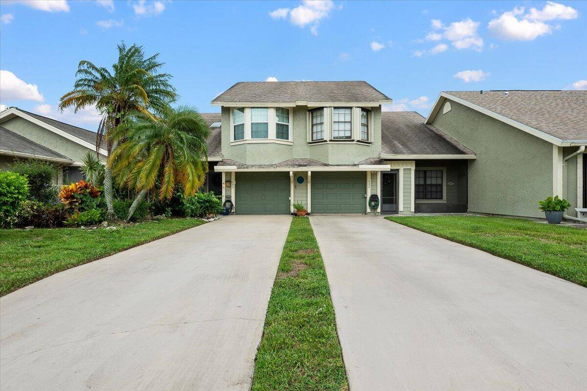 Don't miss this incredible opportunity to own a 3 bedroom, 2 bathroom home with a 1 car garage in the highly desirable Villas of Village Green community !