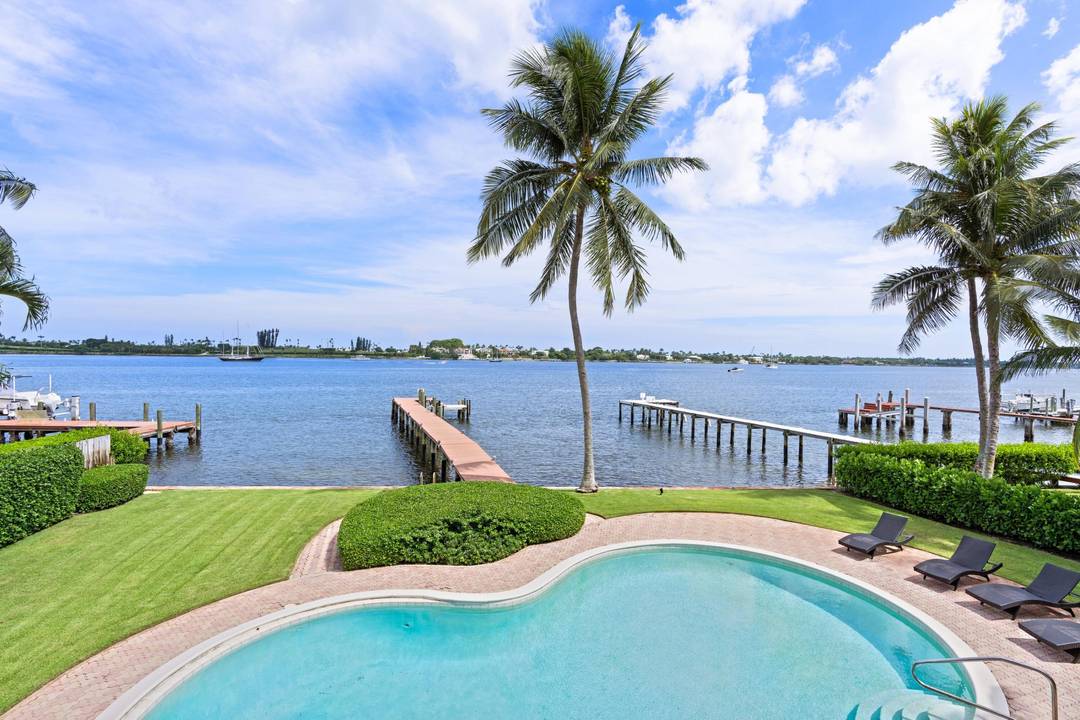 Experience timeless waterfront living at 3304 N Flagler Drive, a beautifully designed 4 bedroom, 4.