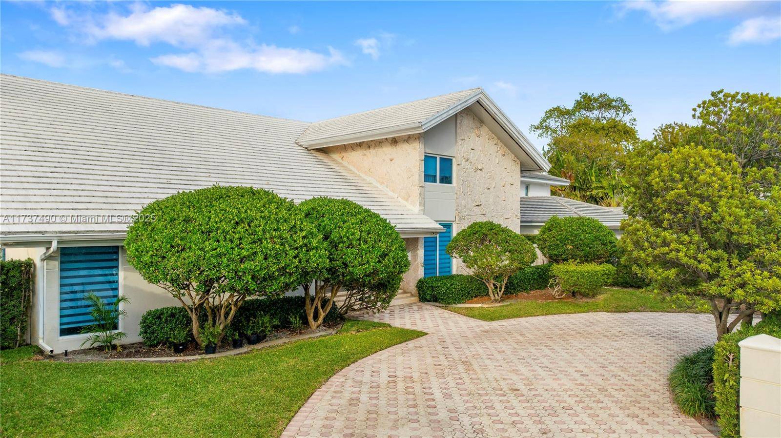 Located in prestigious Bay Harbor Islands, one of the most coveted neighborhoods in Miami, is this 5090sqft mid century modern home rebuilt in 2009 !