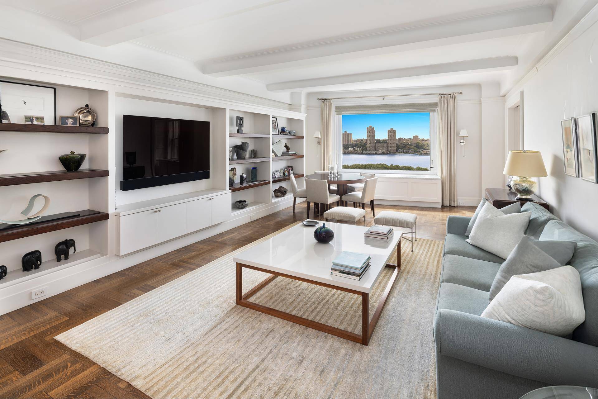 Perched high above Riverside Drive, this exceptional residence features 3 bedrooms 2 baths and a powder room, with spectacular panoramic views of the Hudson River, Riverside Park and beyond.