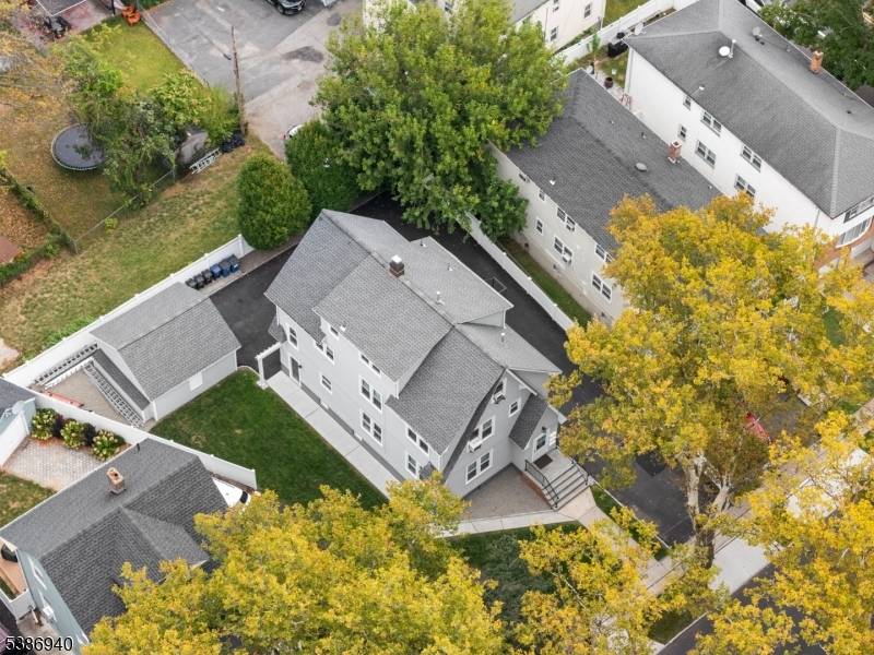 This legal 3 family home sits on one of Bloomfield's most beautiful blocks, offering passive income potential, prime location, and low maintenance ownership.
