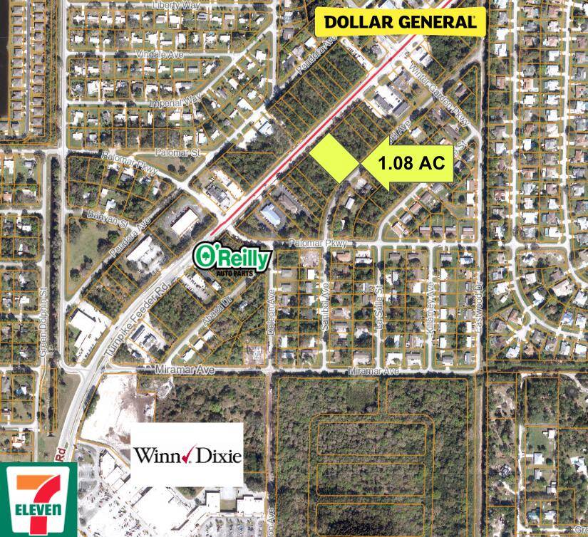 Prime development site off Turnpike Feeder Road in Fort Pierce, over an acre of land, offers exceptional visibility and accessibility.