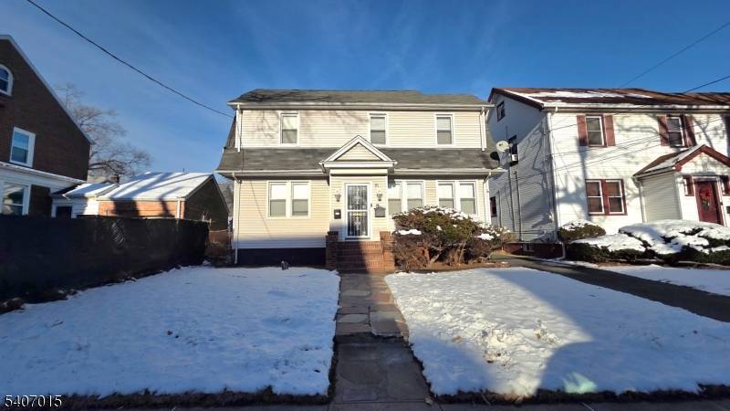 Come and see this spacious 4 bedroom Colonial home that has a backyard deck, a sunroom, and a detached garage !