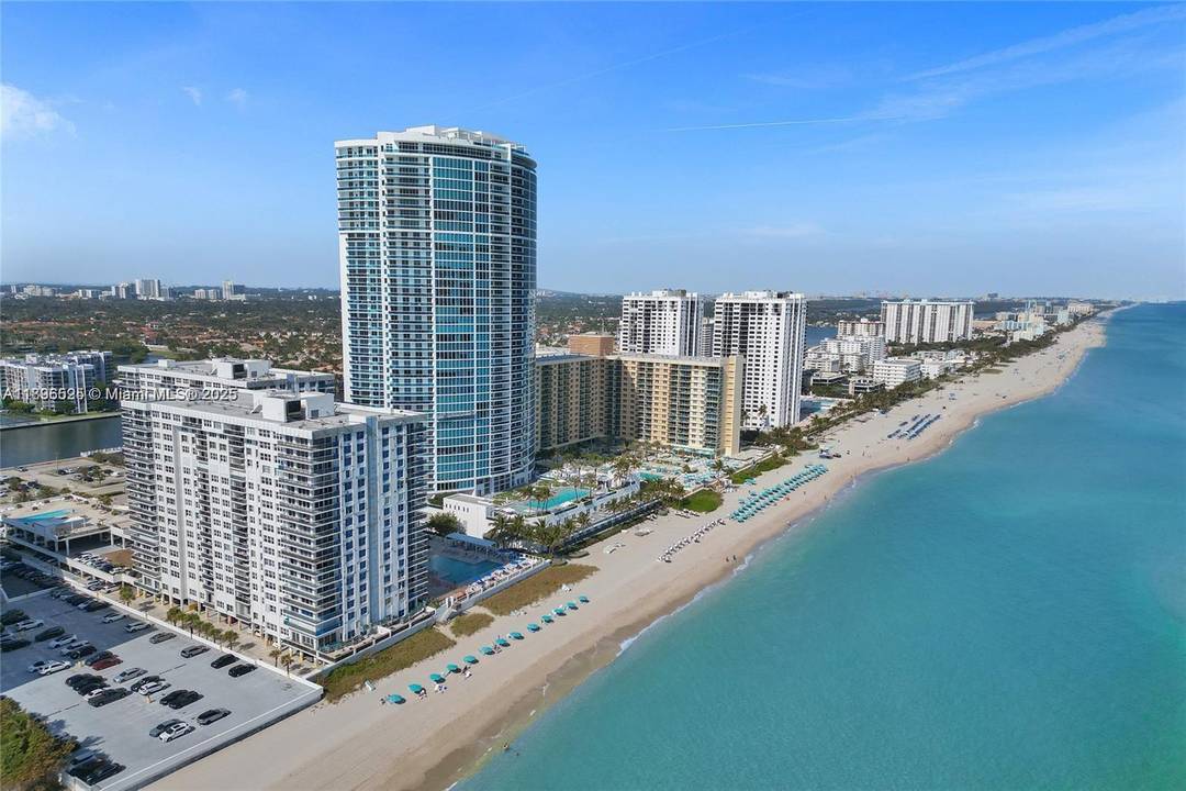 Spectacular corner unit apartment with wrap around balcony.