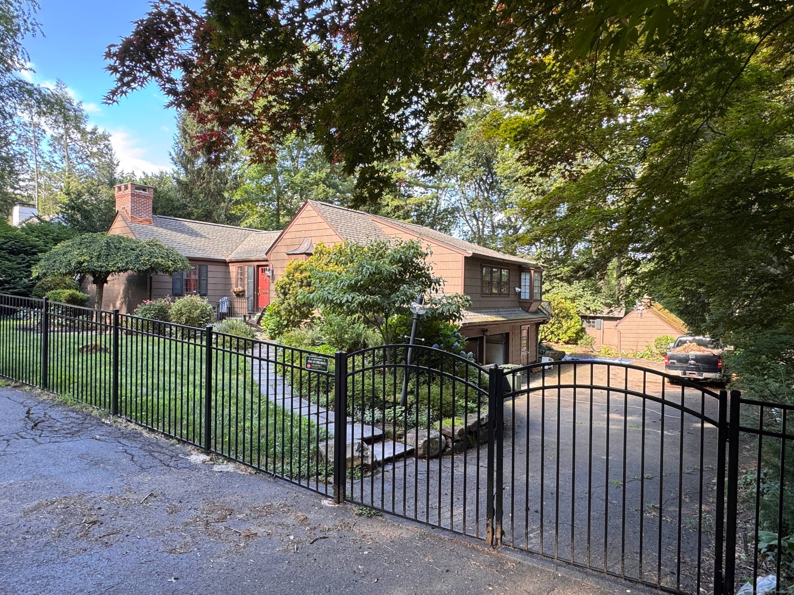 A beautiful family home Lovely and surprisingly spacious cottage on park like grounds.