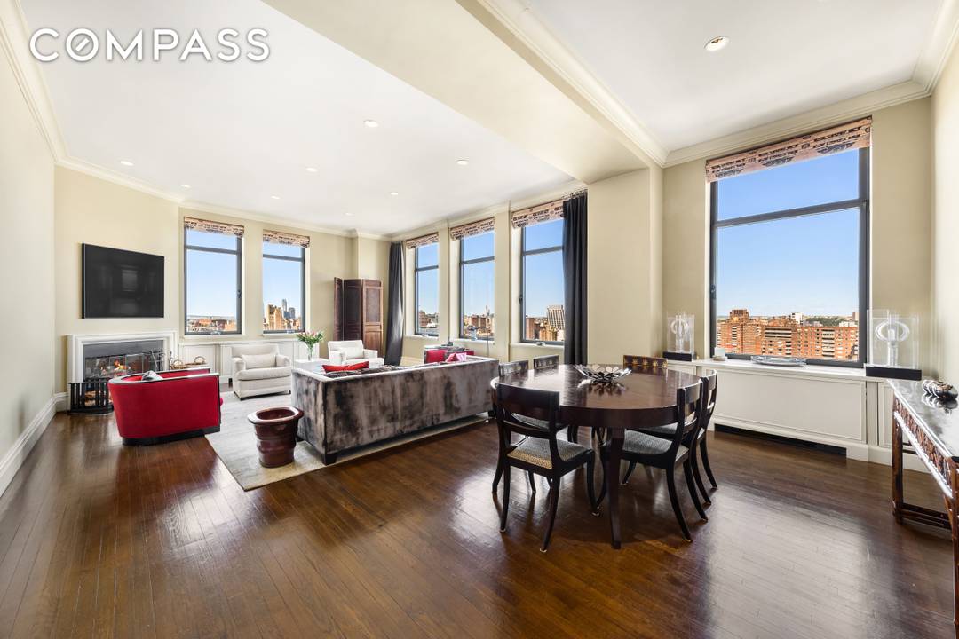 This duplex penthouse residence feels like a townhouse in the sky, with a gracious entry hall leading to the living dining space, kitchen and two bedrooms on the first floor.