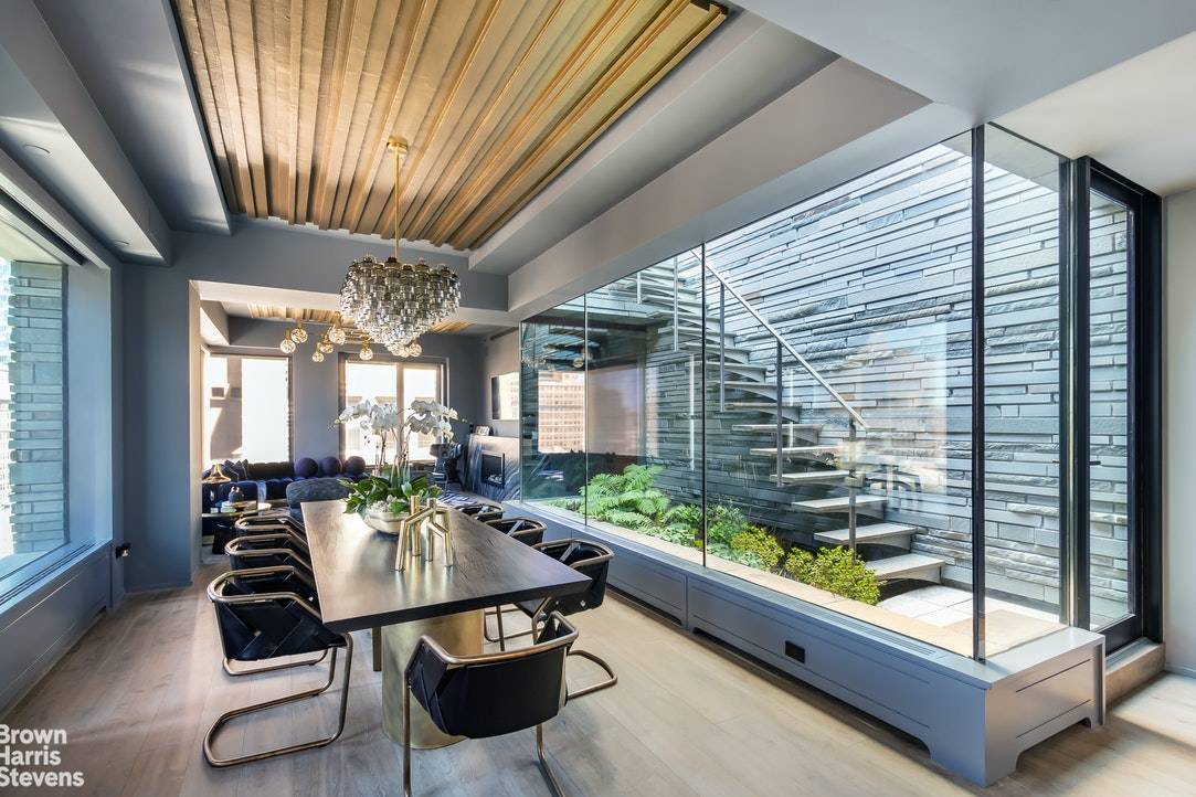 This chic full floor Penthouse boasts a huge private terrace, immaculate modern finishes, 10' ceilings, and approximately 2505 sq ft of interior space.