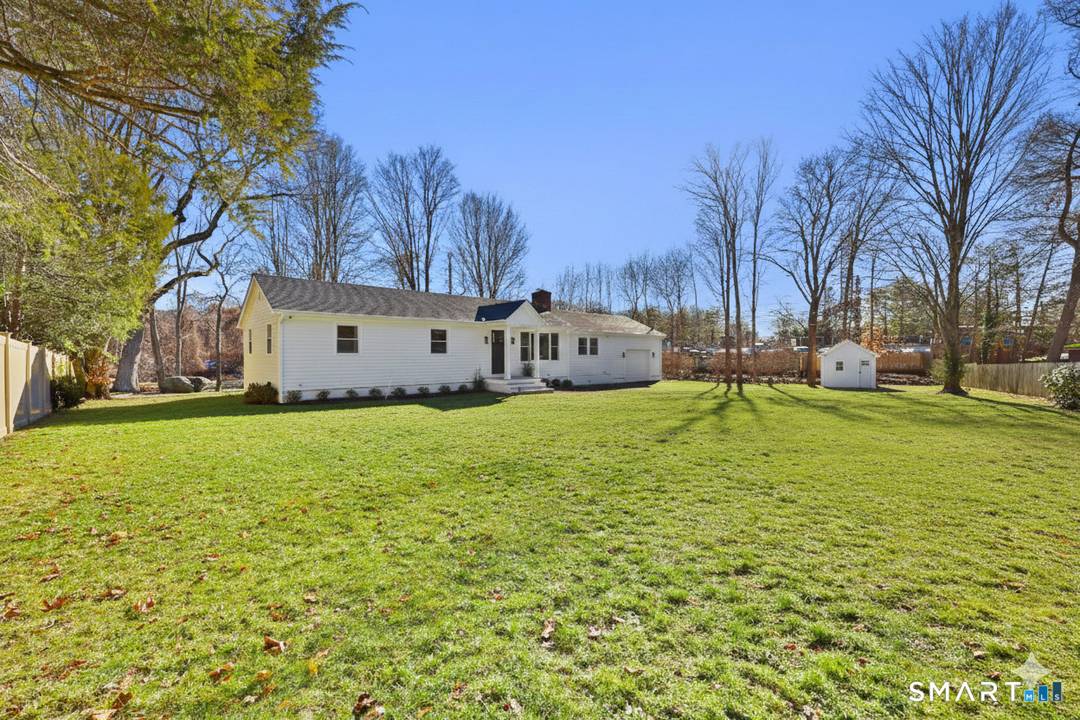 Nestled at the end of a cul de sac in Rowayton, Norwalk's beloved coastal village, this beautifully renovated ranch offers easy, turnkey living with room to spread out.