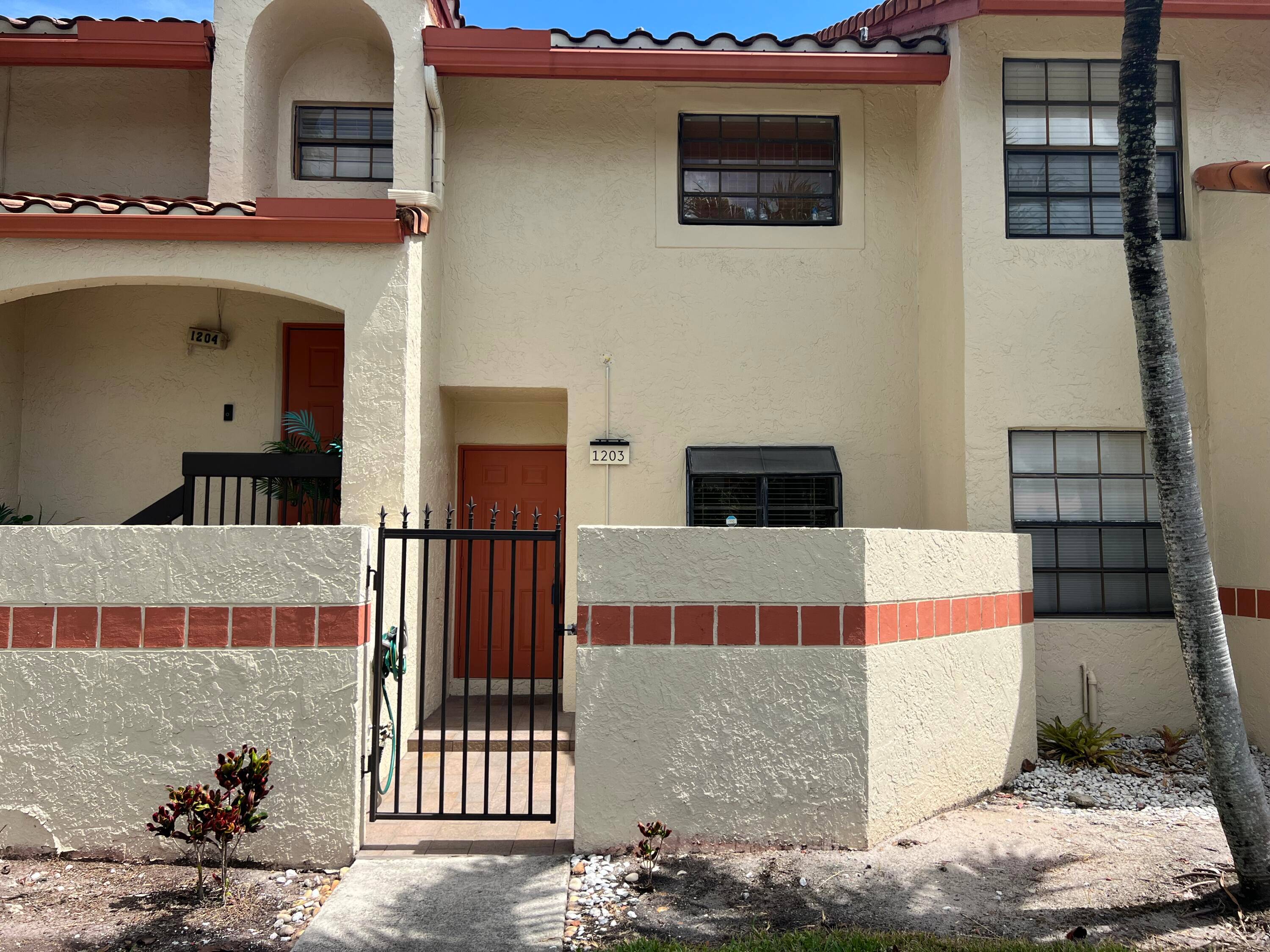 Lovely ground floor condo with a new kitchen, bathrooms, light fixtures and more.