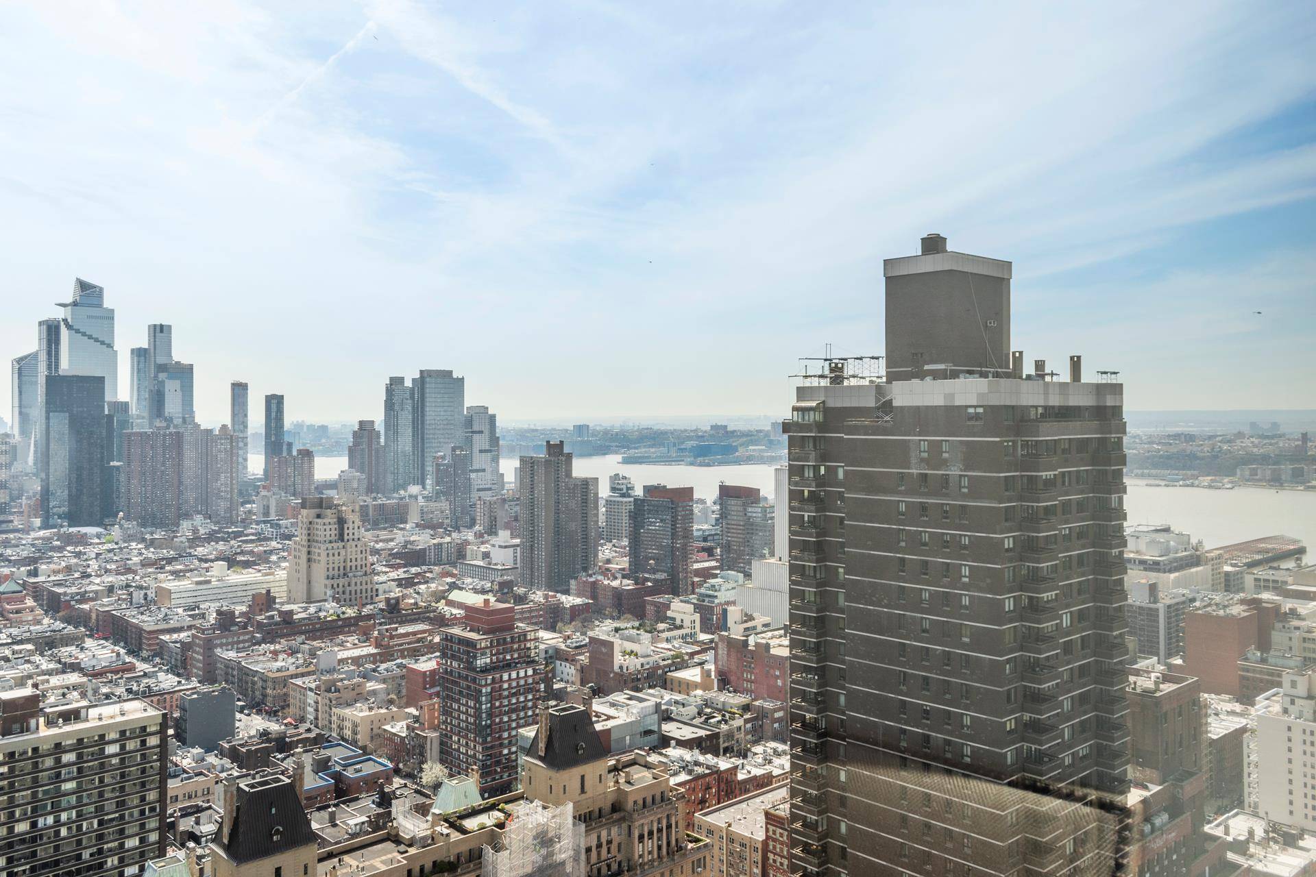 56D has a Spectacular CENTRAL PARK View and Serene Hudson River View, and open City landscapes from floor to ceiling windows.