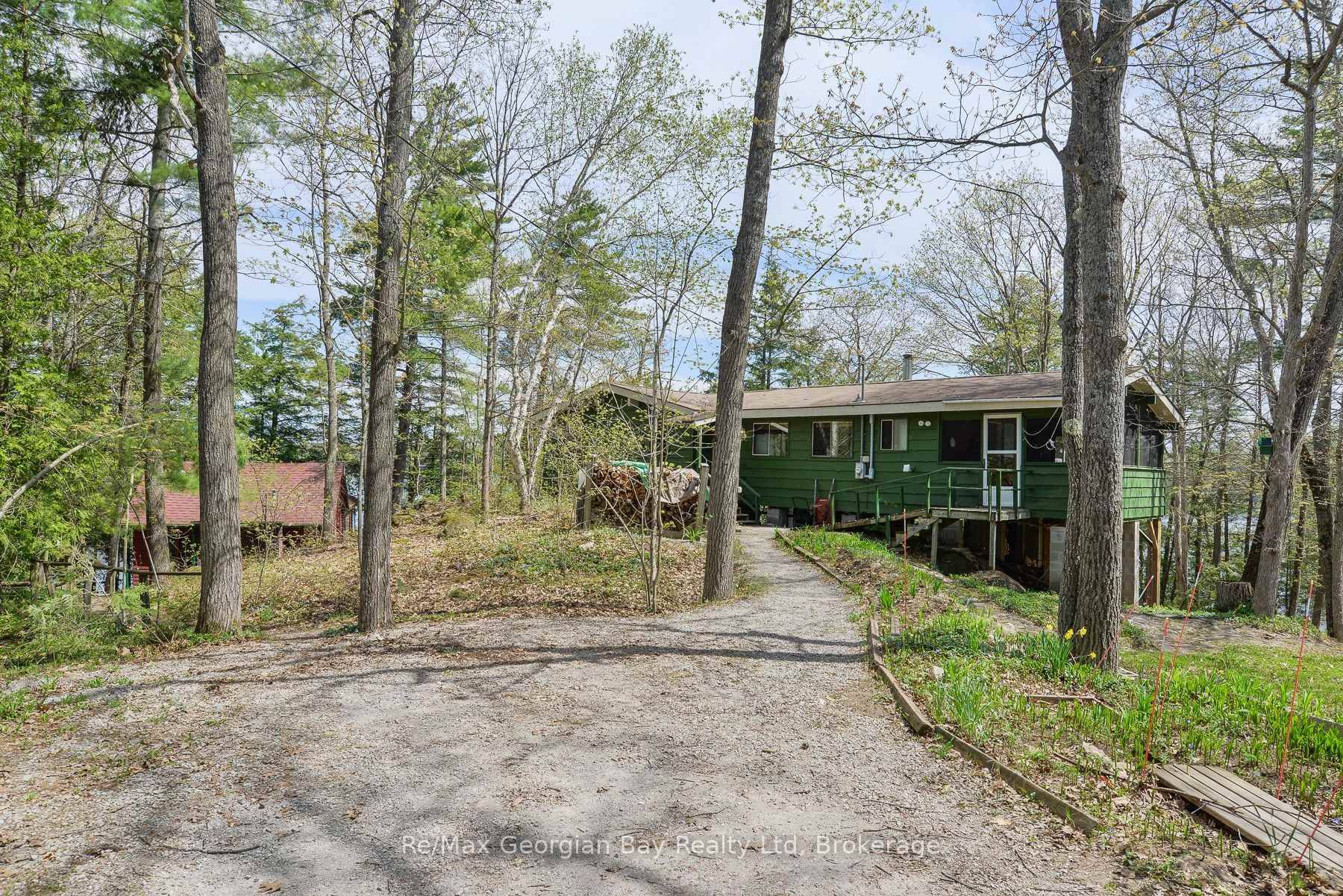 Discover the ultimate waterfront retreat with a million dollar view on beautiful Six Mile Lake !
