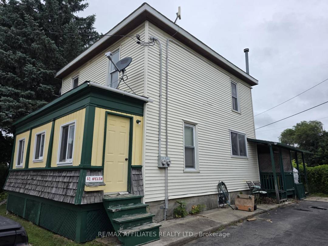 THIS DUPLEX ON TRIANGLE CORNER LOT ON HELEN STREET IN SMITHS FALLS IS READY FOR YOUR PERSONAL TOUCH AND HAS SO MUCH POTENTIAL FOR INVESTMENT OR, FOR THE RIGHT BUYER, ...