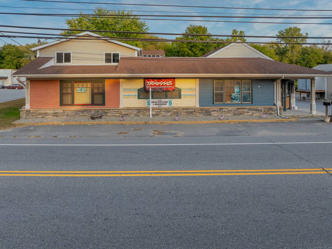 This versatile property offers the perfect blend of business and residential living in one prime location on Route 12.