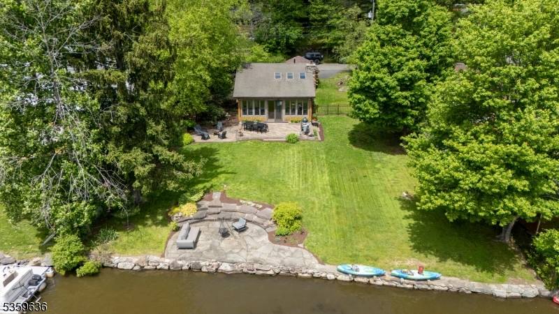 Are you looking for a log home directly on a lake, with a brand new septic, that's been updated, maintained through the years ?