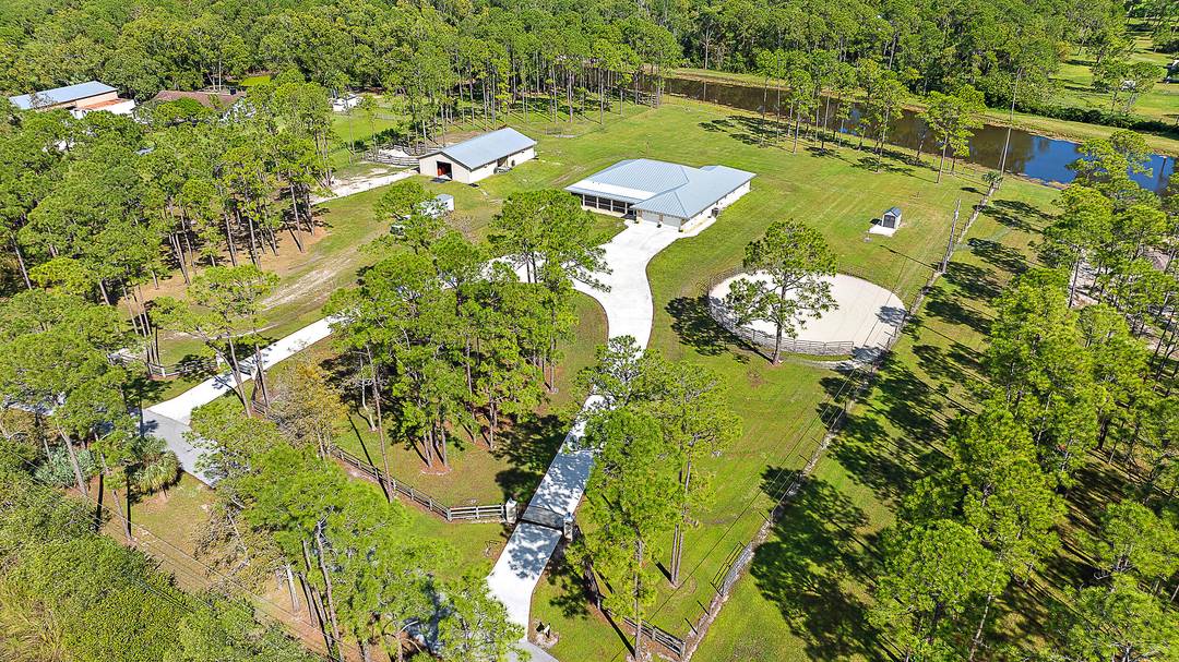 A compelling value on 5 acres, this CBS built home offers nearly 3, 000 sqft under air, a metal roof 2022, and a 2, 000 sqft center aisle barn 2018.
