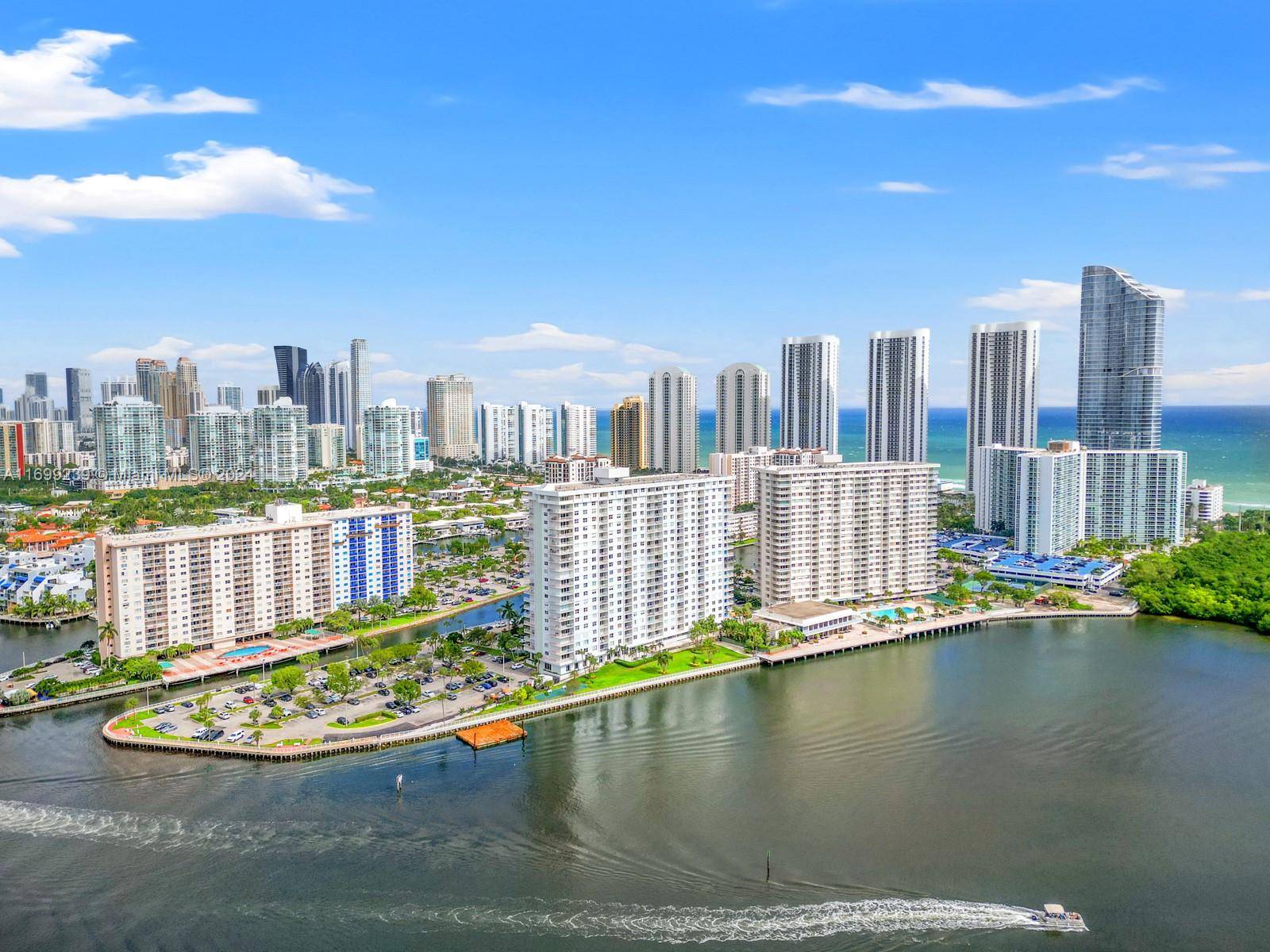 Luxurious 2 bed, 2 bath penthouse at 500 Bayview Dr PH 21 in Sunny Isles Beach boasts breathtaking Intracoastal and city views.