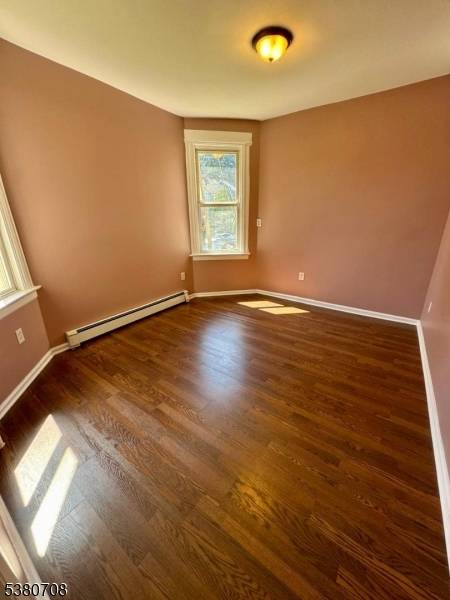 Turnkey 3 family Newark home with strong rental potential !