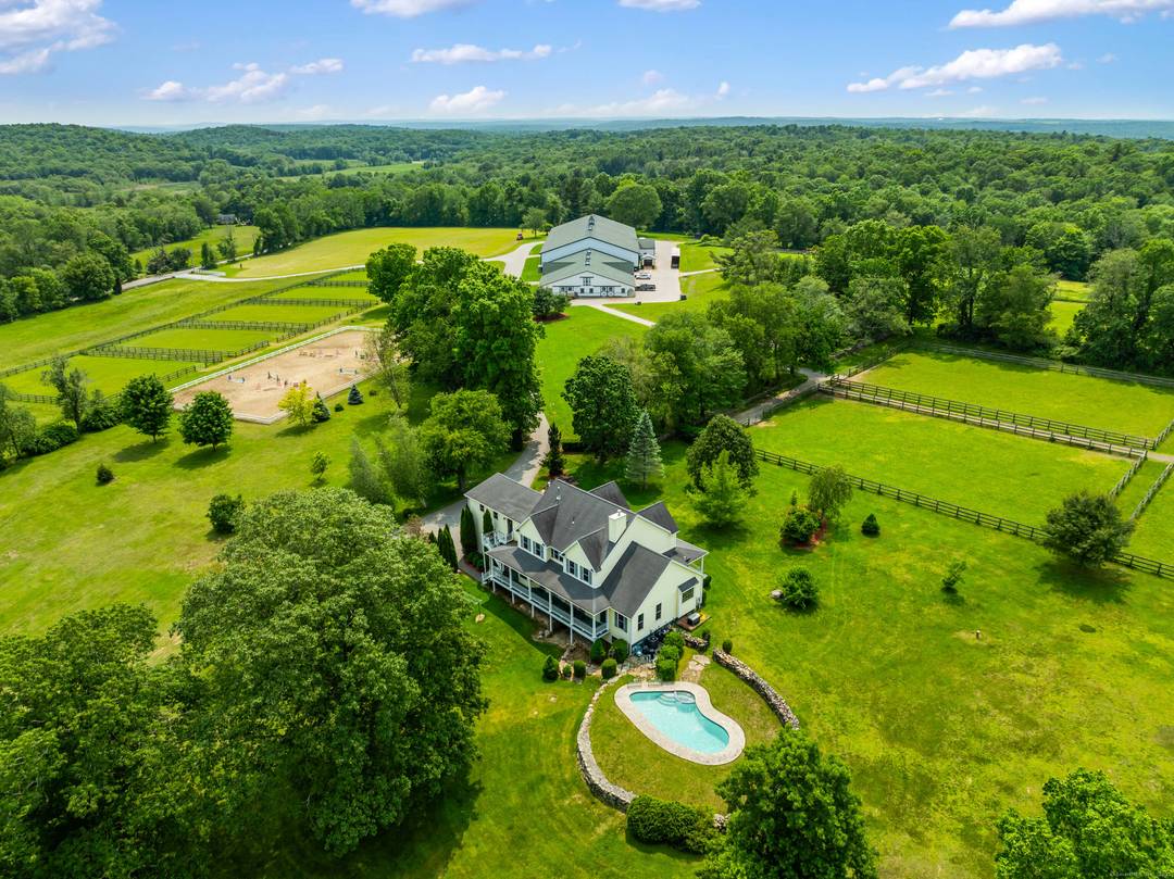 PROMINENT 55 ACRE EQUESTRIAN FACILITY w PRIMARY 6, 000SF RESIDENCE w 2 APARTMENTS !