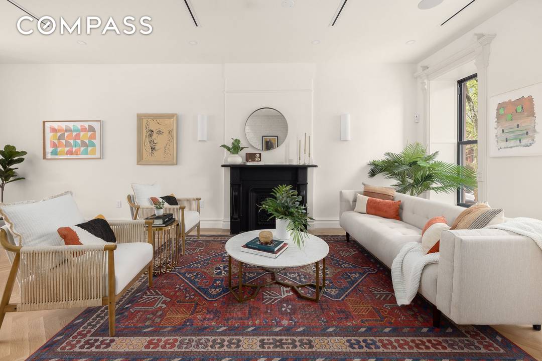 This meticulously renovated single family home offers five bedrooms, four full bathrooms, and two powder rooms, combining impressive scale with a layout designed for both everyday living and entertaining.